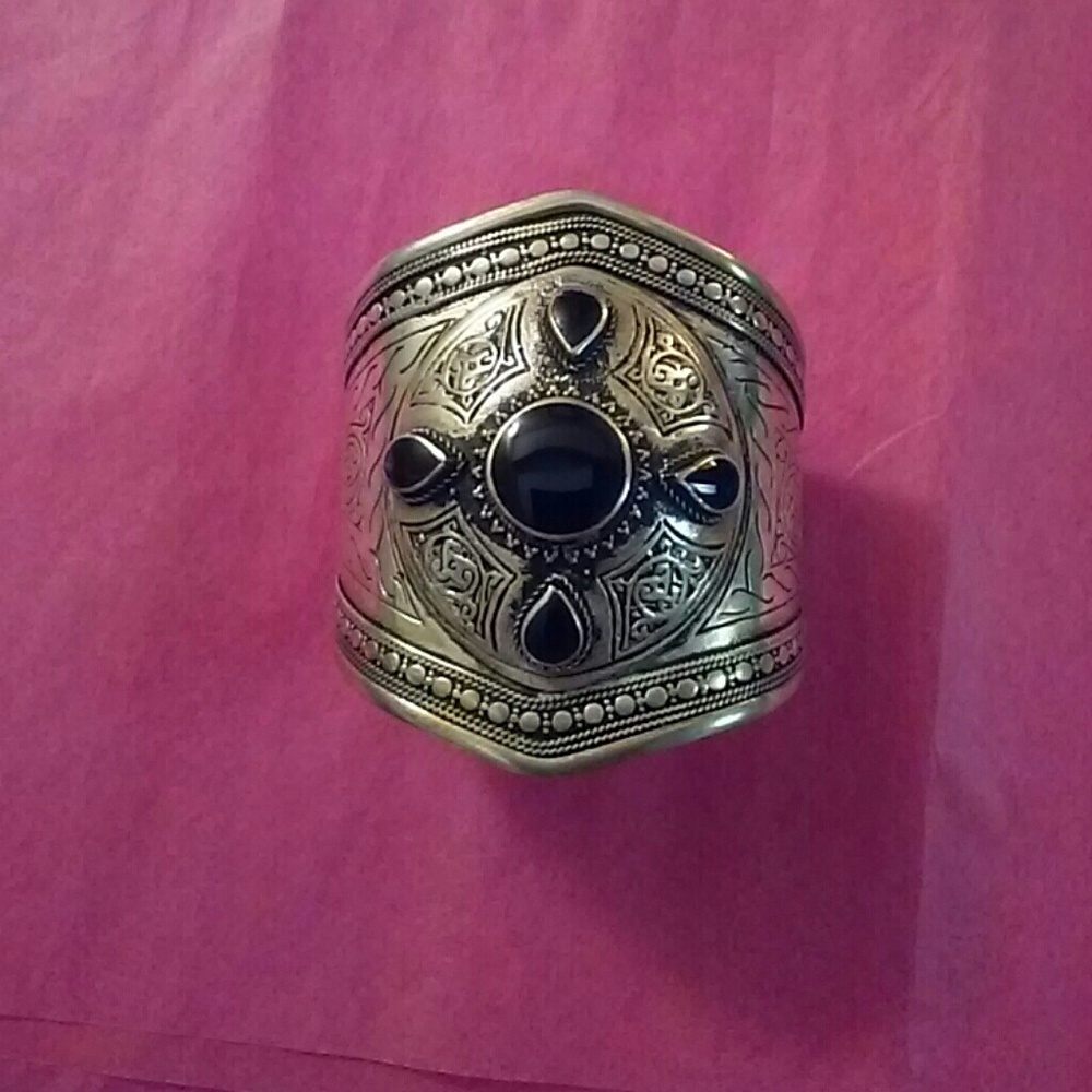 Large cuff. Flexible to adjust to your wrist.